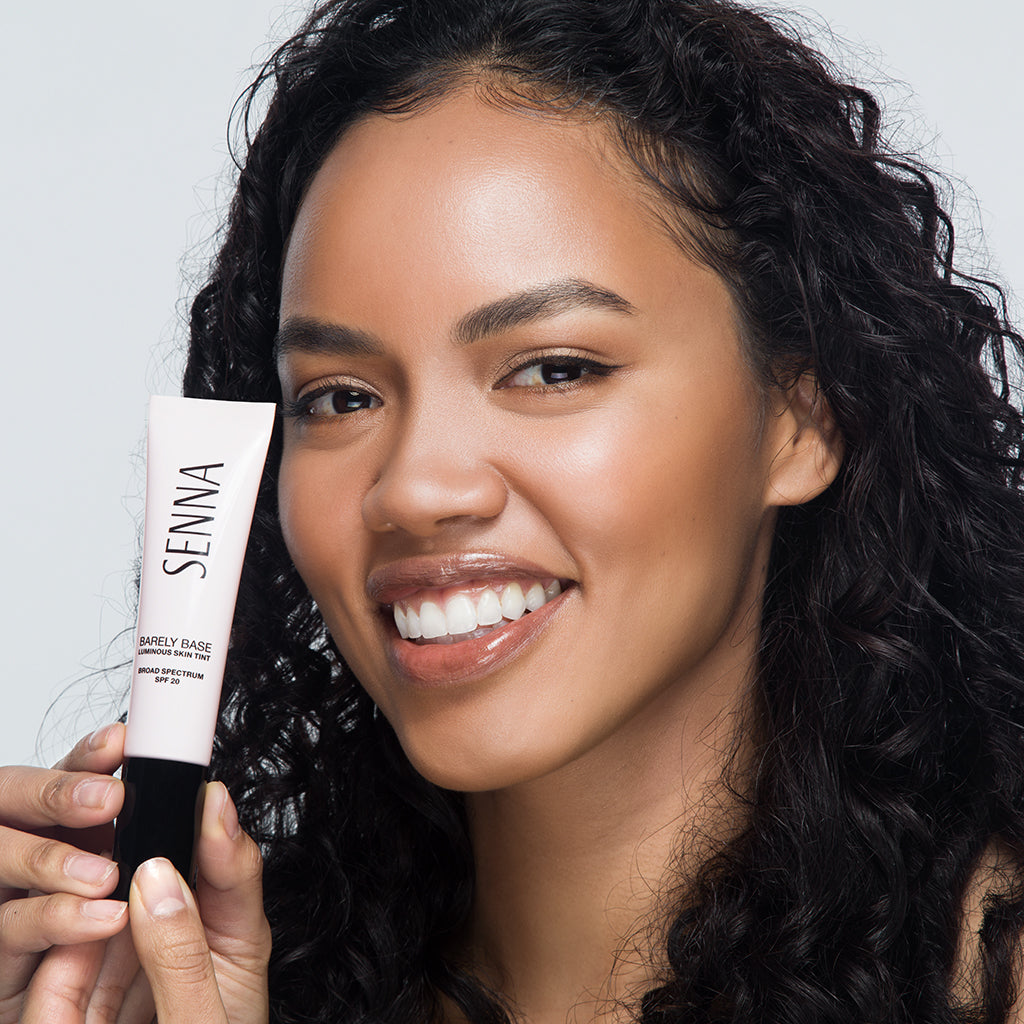 Senna Barely Base Luminous Skin Tint SPF20 model wearing shade TAN-1 - TAN NEUTRAL