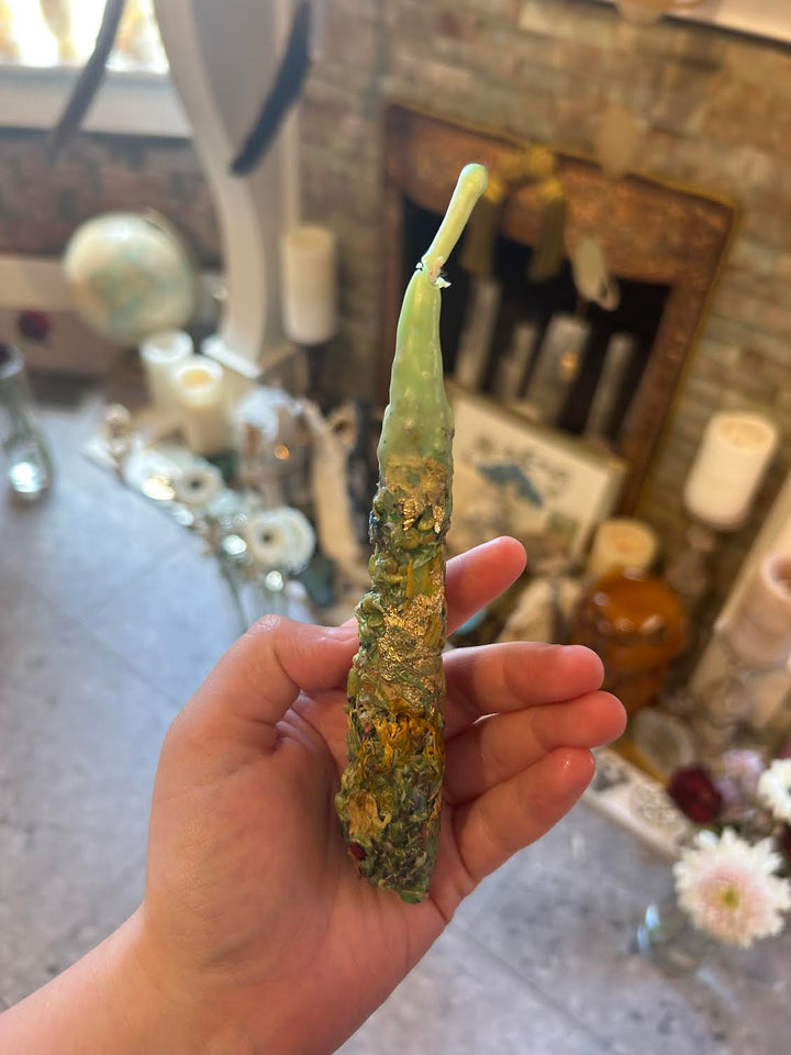 This is the green intention candle made by a witch up in Latvia.