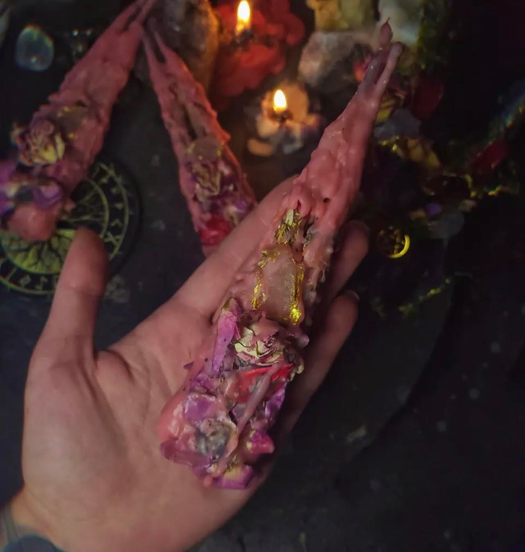 This is the pink love intention candle made by a witch up in Latvia.