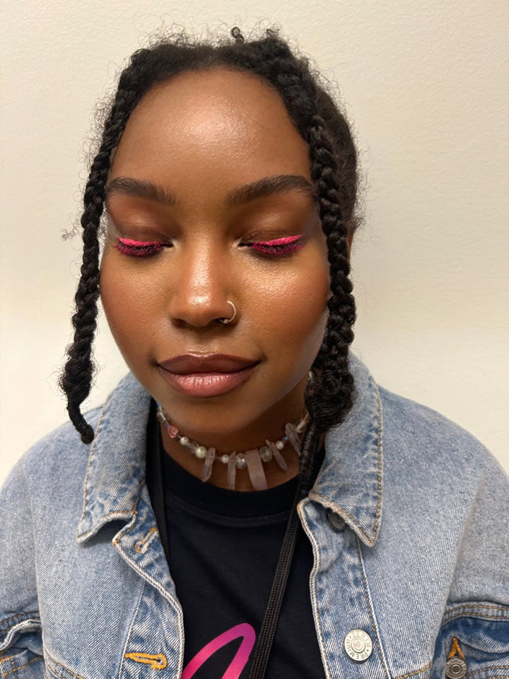 Pink UV Vegan Mascara with a pink liner on the eyes