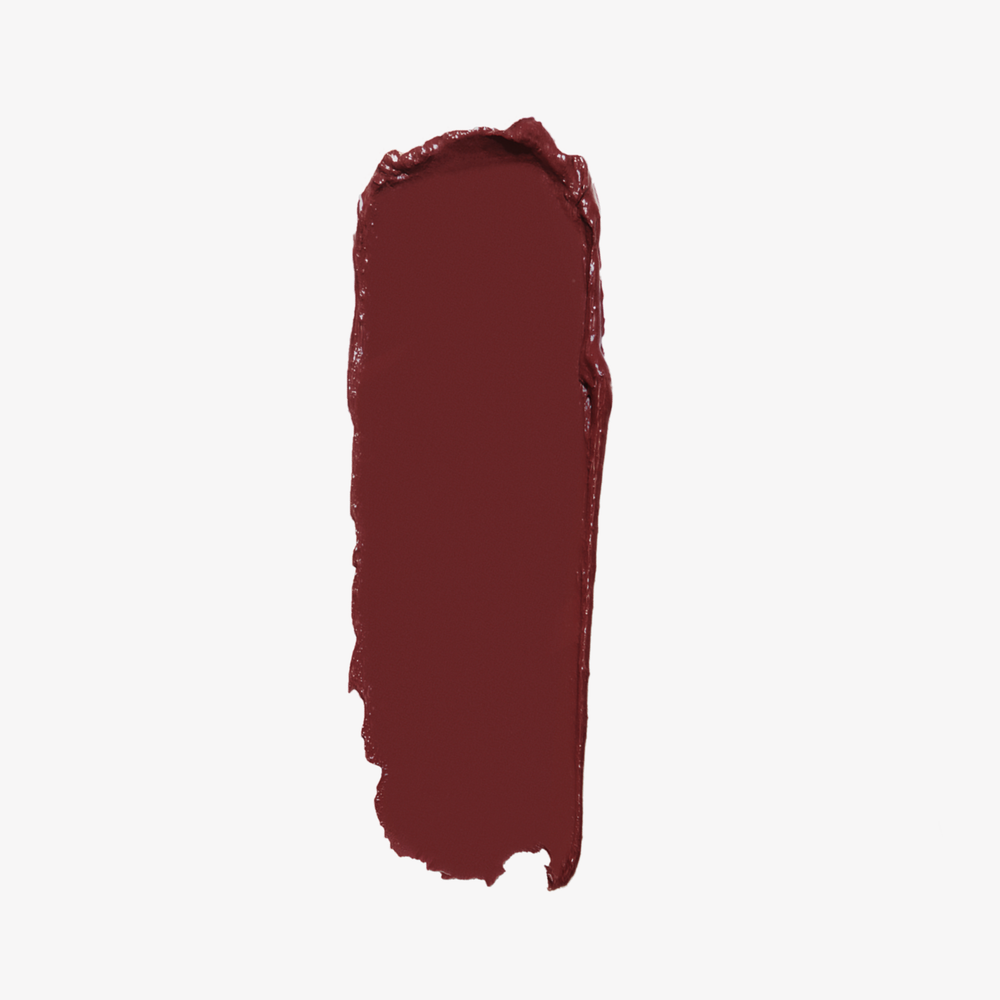 This is a swatch of the Dose of Color Liquid Matte Lip, Shade: Brick.