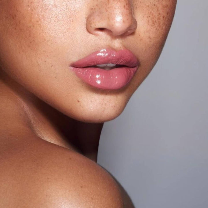 a model wearing the cupcake colorfix glaze. It makes the lips look so fresh, pretty, and plump.