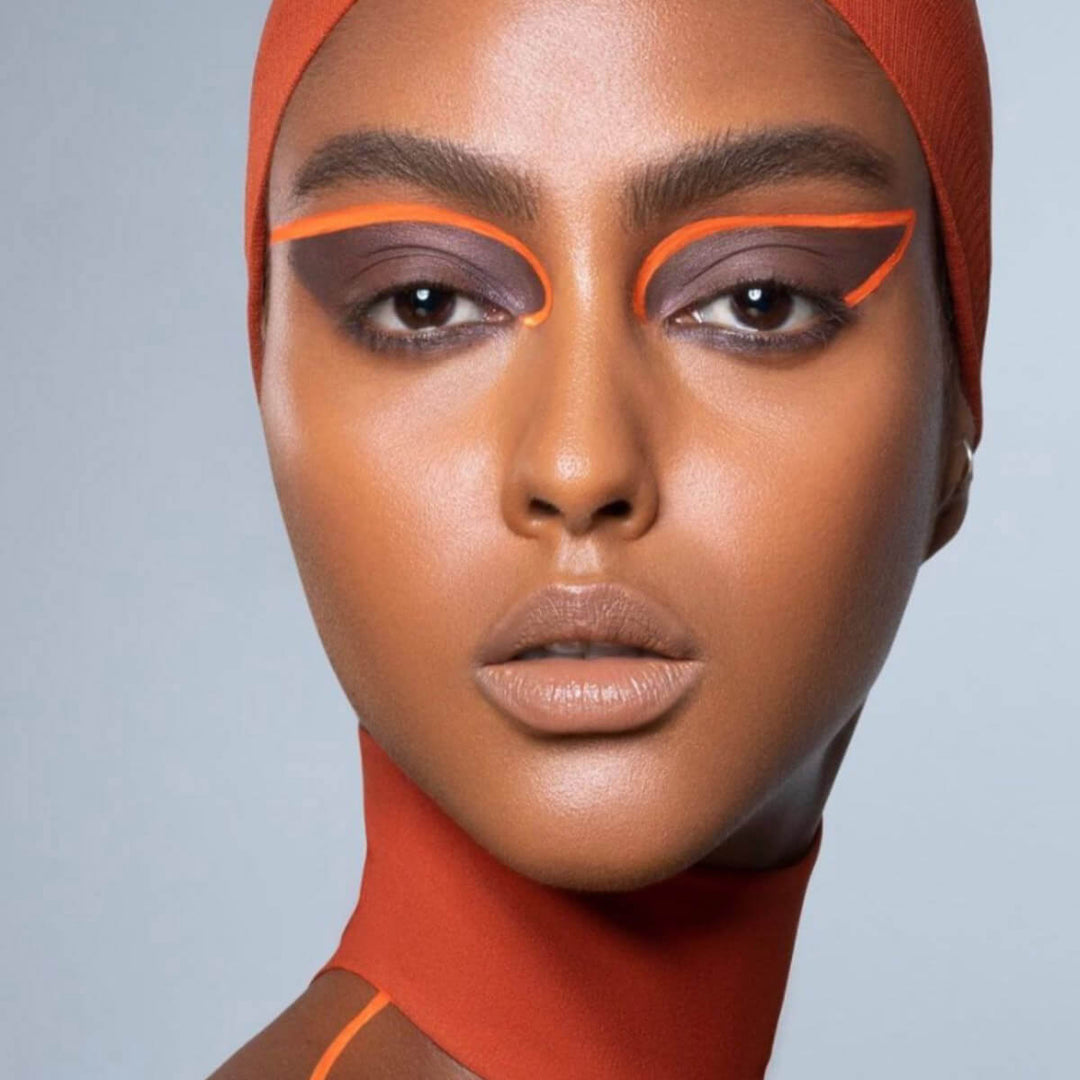 This is a model with the colorfix matte carrot top shade as a orange eyeliner giving such a new age look.