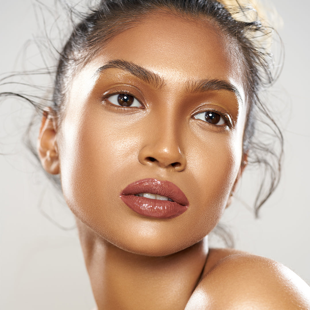 This is a model wearing the colorfix matte coffee cake shade on her lips 
