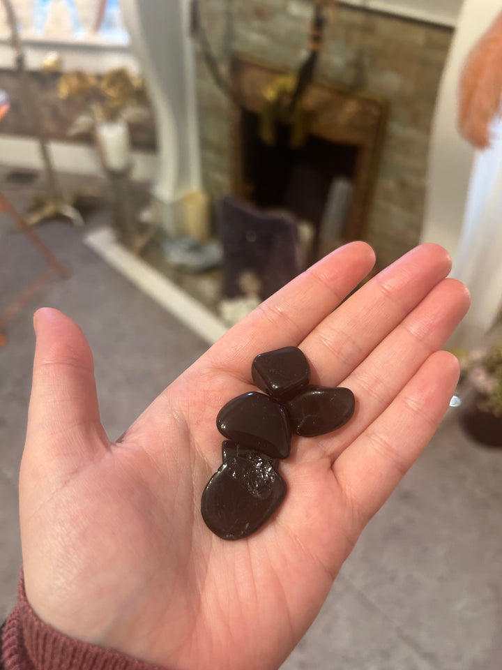 Onyx Tumblers in the plam of a hand