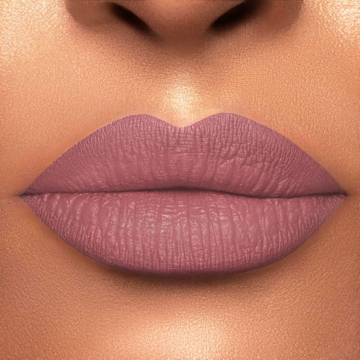 This is a light skin tone lip swatch of the Lazy Daisy Liquid Matte Lip.