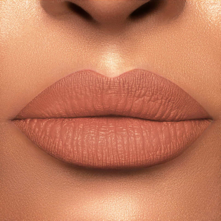 This is a light skin tone lip swatch of the Nude Mood Liquid Matte Lip.