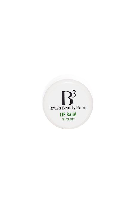 The face of the peppermint lip balm with the black and white lid except for lip balm and peppermint in green
