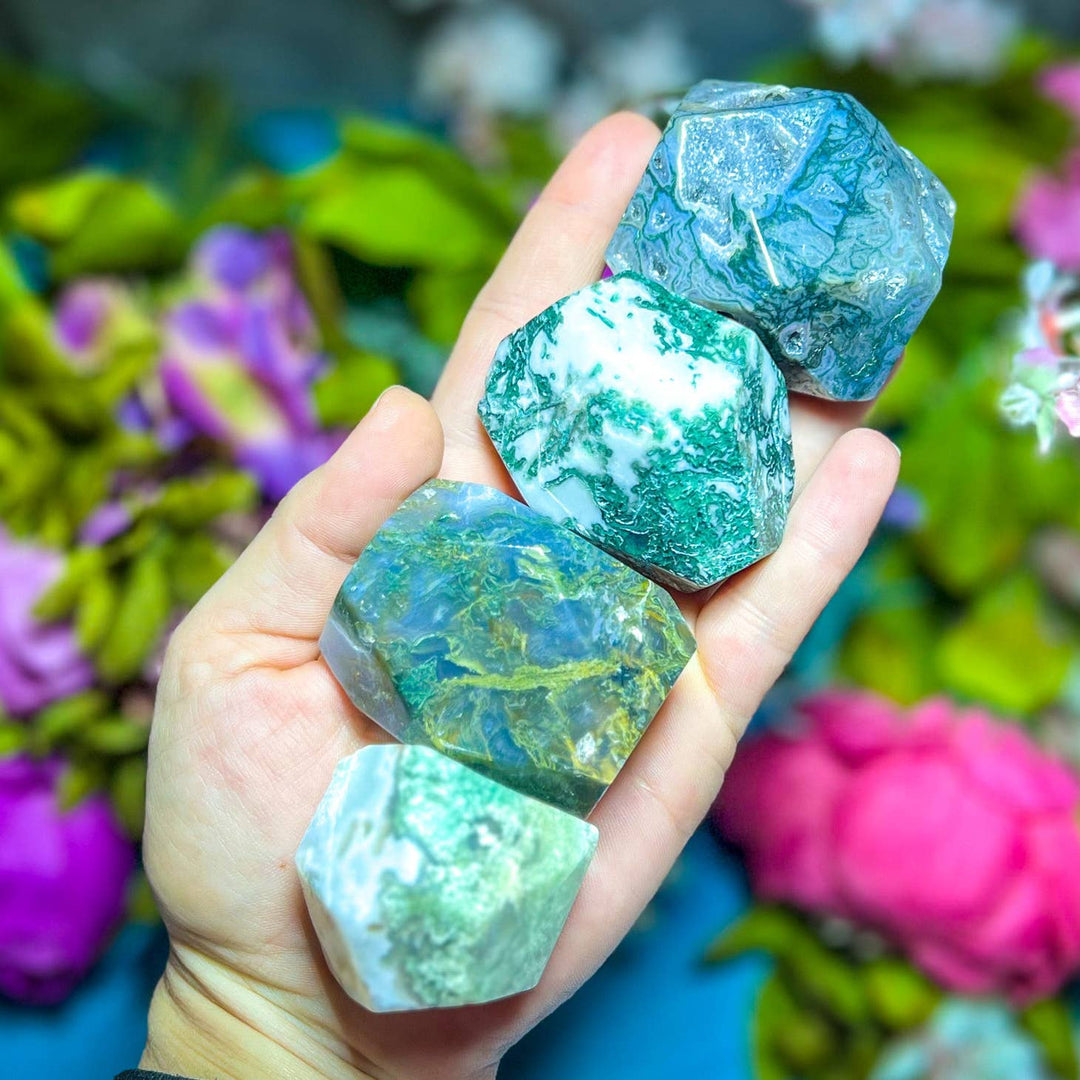 Moss Agate Crystal Freeforms on the palm of a hand