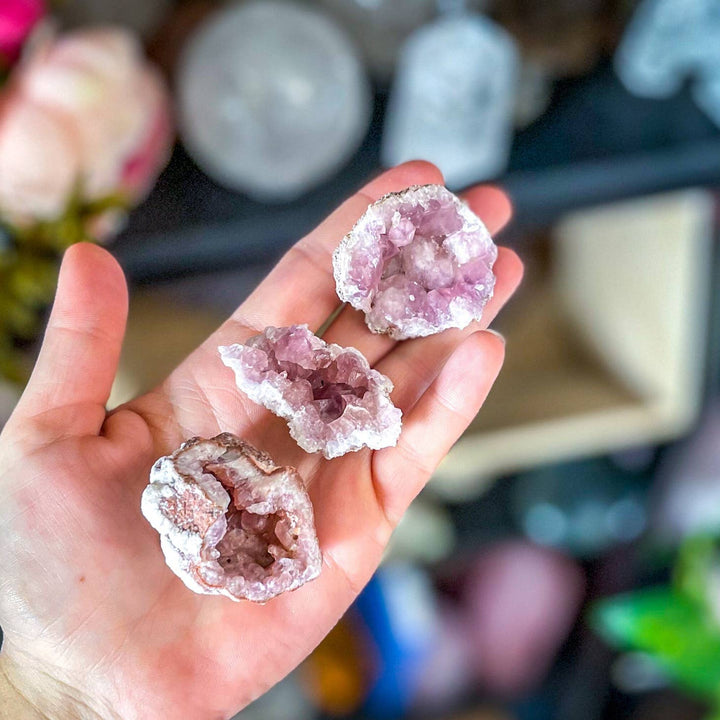Small Pink Amethyst Crystal Clusters in the palm of the hand