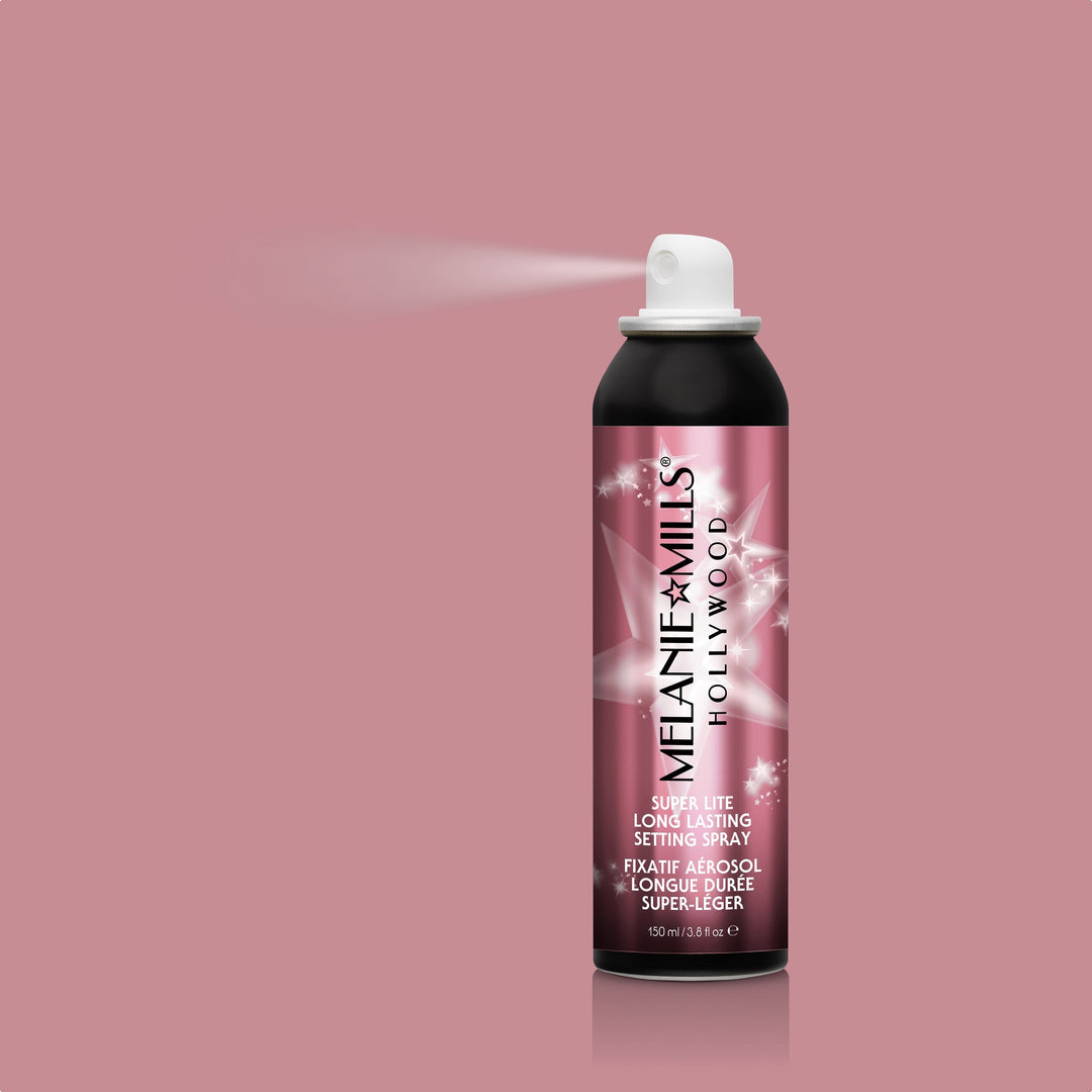 Super Lite Long Lasting Setting Spray being sprayed