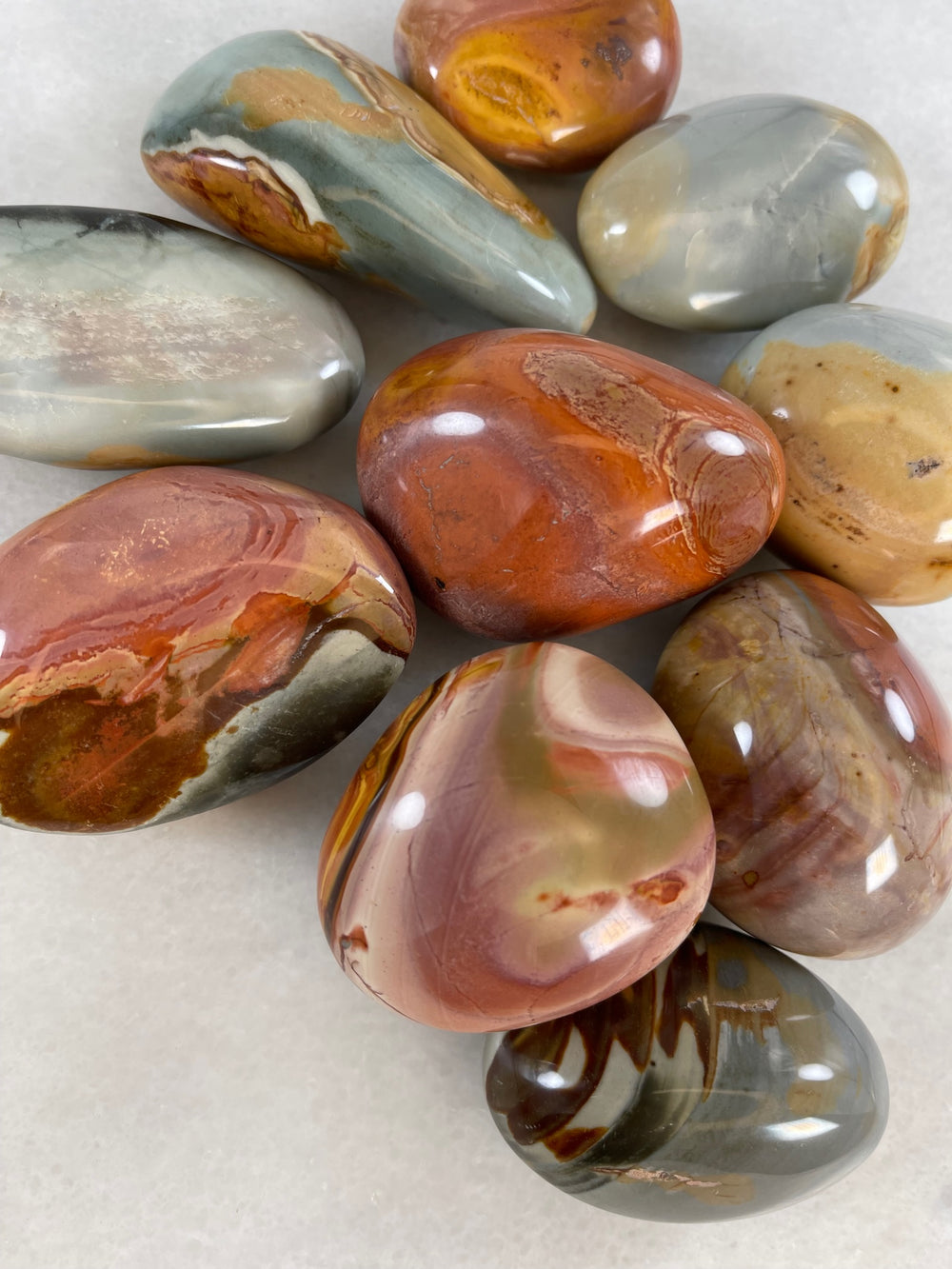 Multiple Large Polychrome/Desert Jasper Palm stones