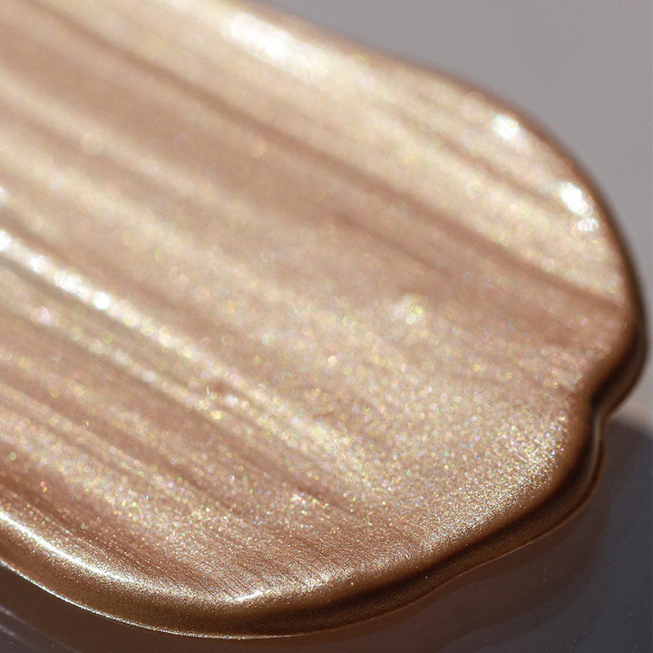 PEACH DELUXE Gleam Face & Body Radiance swatch close up