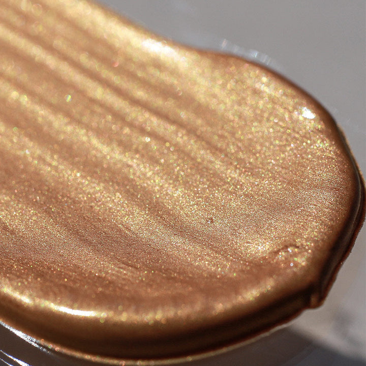Rose Gold Gleam Face & Body Radiance swatch close up