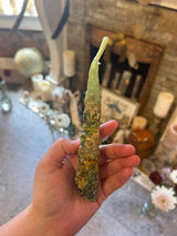 This is the green intention candle made by a witch up in Latvia.
