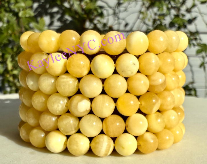 8mm Natural Orange Calcite 7.5” Stretch Bracelet