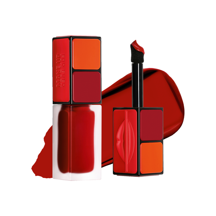 Red and orange makeup products with a Rubik's Cube design on a white background