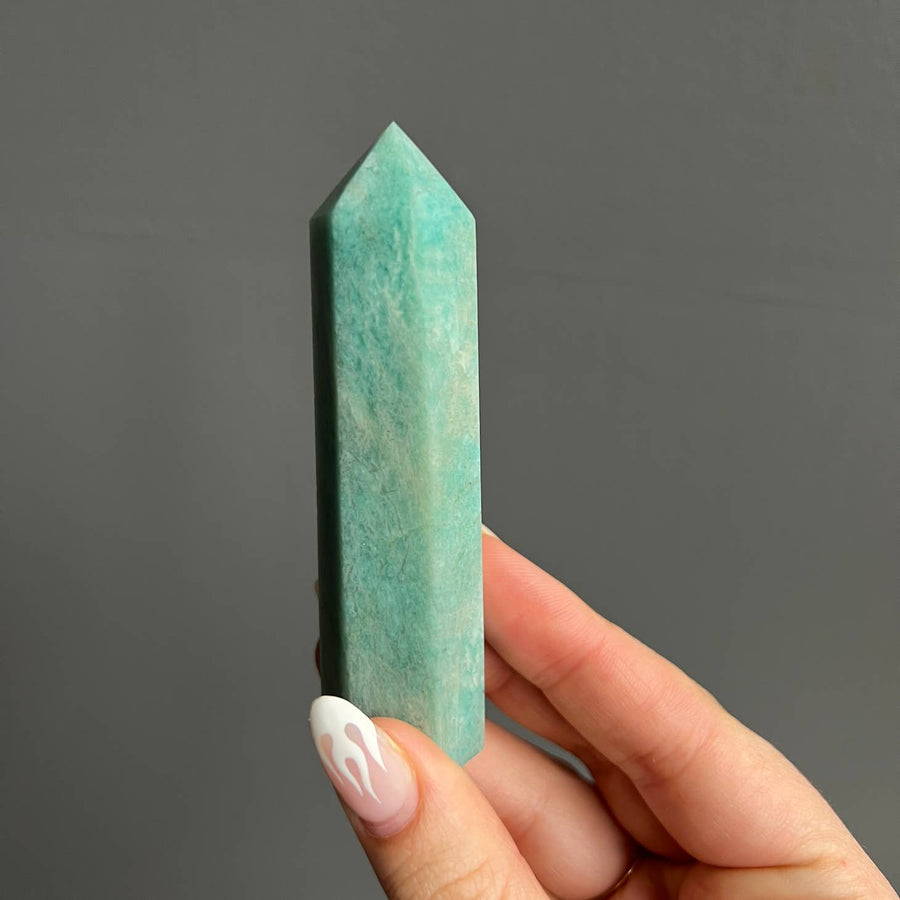 This is an Amazonite crystal tower that is a beautiful blue-ish green.