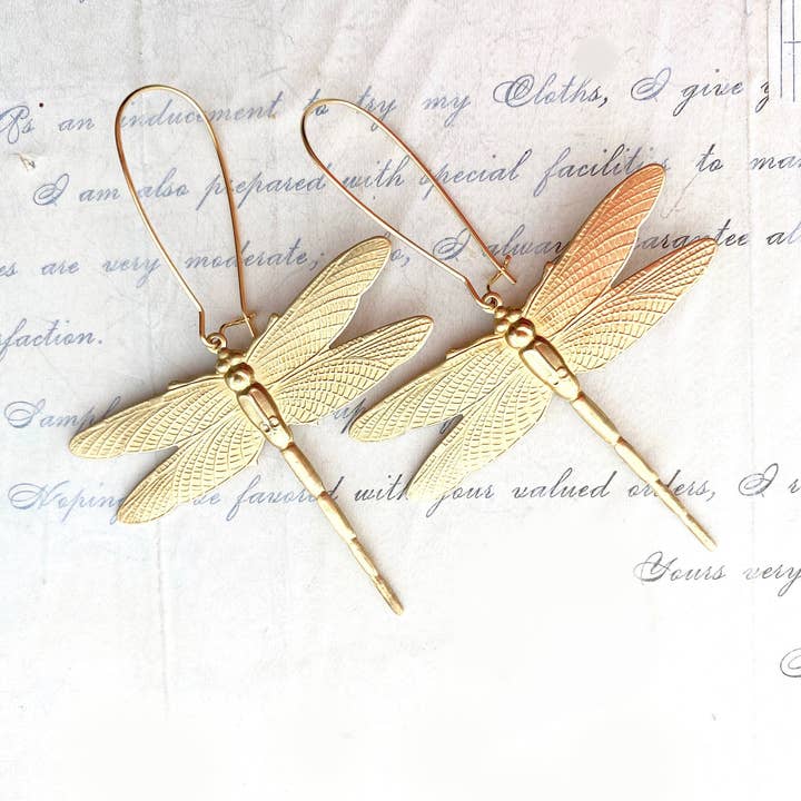 Dragonfly Earrings laying down