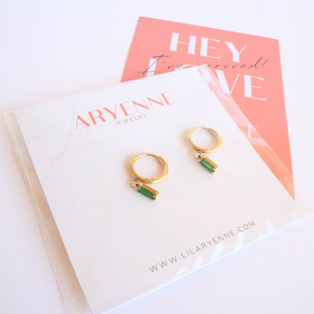 Emerald Dangle Earrings in the package