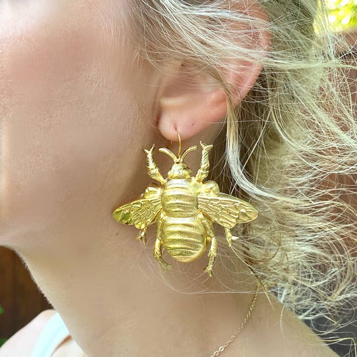 Bumble Bee Earring hanging on ear