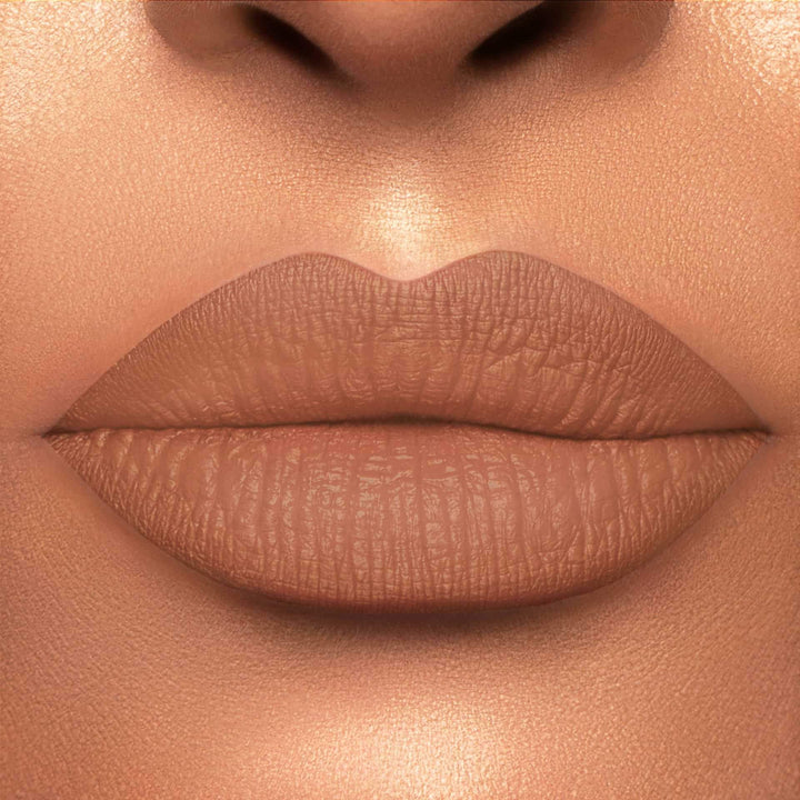 This is a light skin tone lip swatch of the Catching Feelings Liquid Matte Lip.