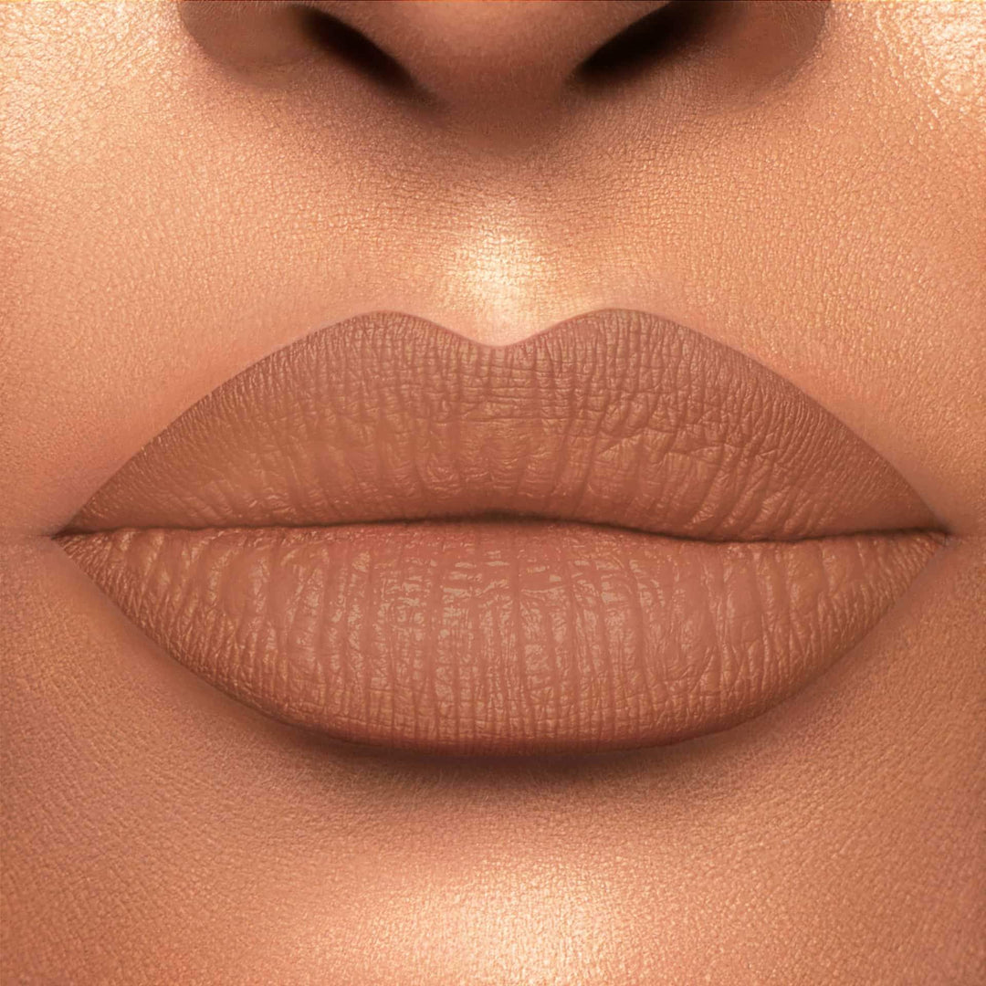 This is a light skin tone lip swatch of the Catching Feelings Liquid Matte Lip.