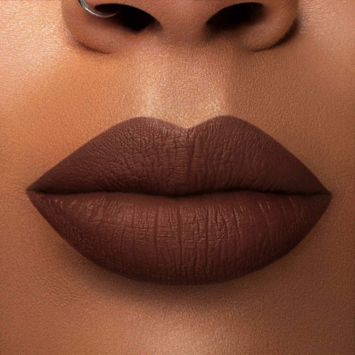 This is a medium skin tone lip swatch of the Chocolate Wasted Liquid Matte Lip.