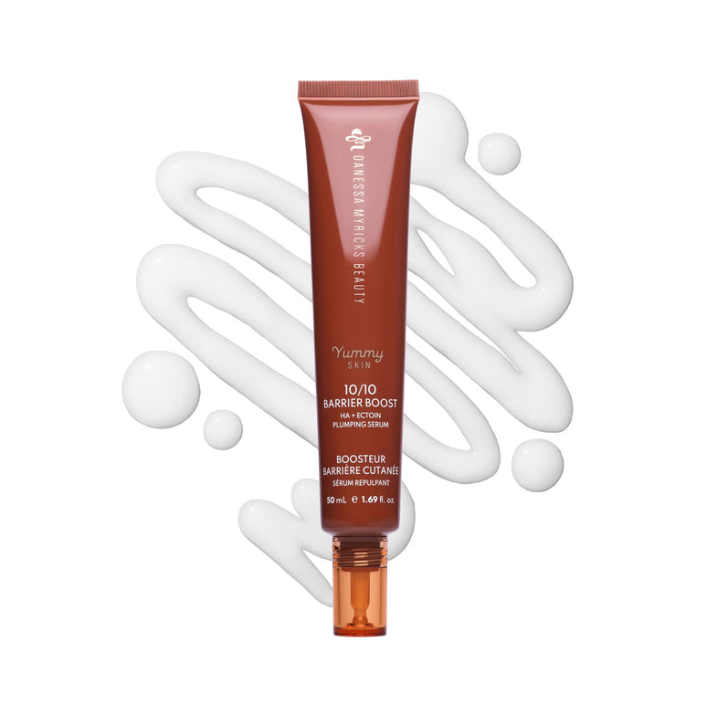Tube of Barrier Boost serum with white cream swatches on a white background