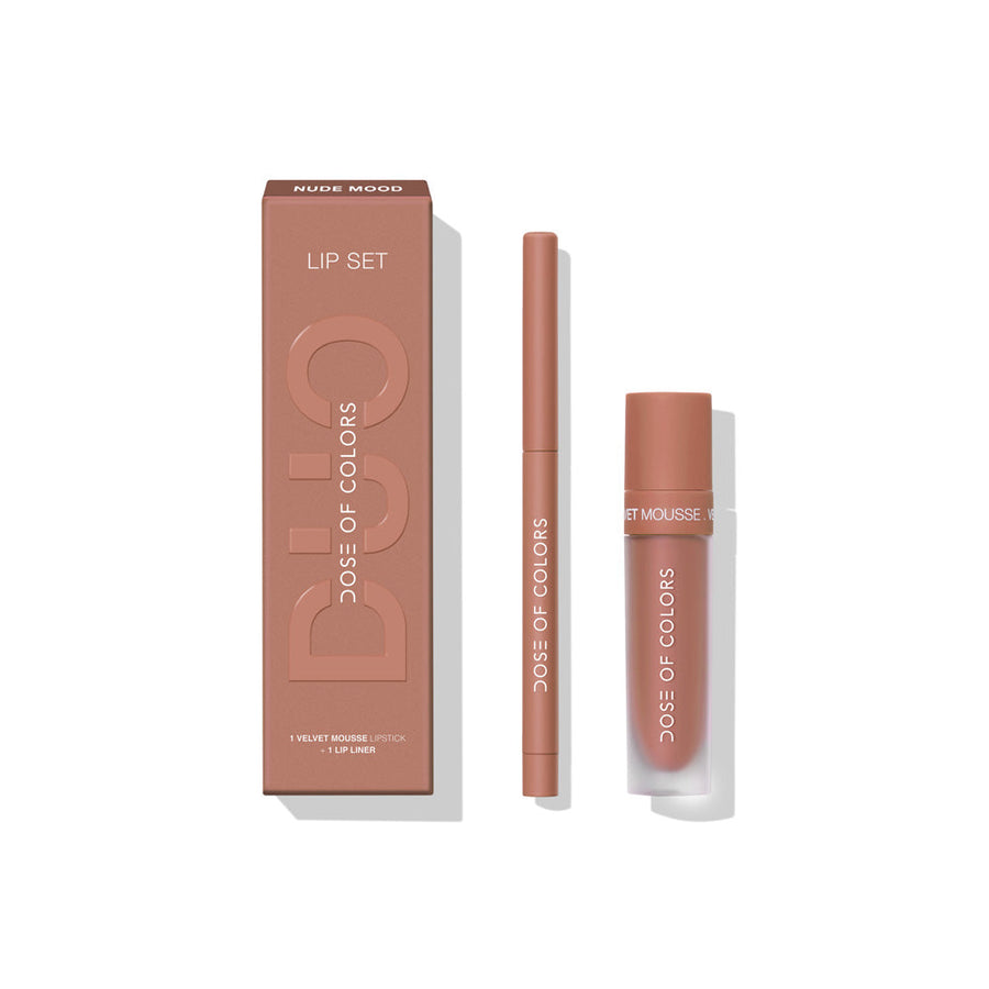 This is the Nude Mood Velvet Mousse Lip Duo with the box, liner, and lip. Pink packaging with a pinky lip and white lettering. 