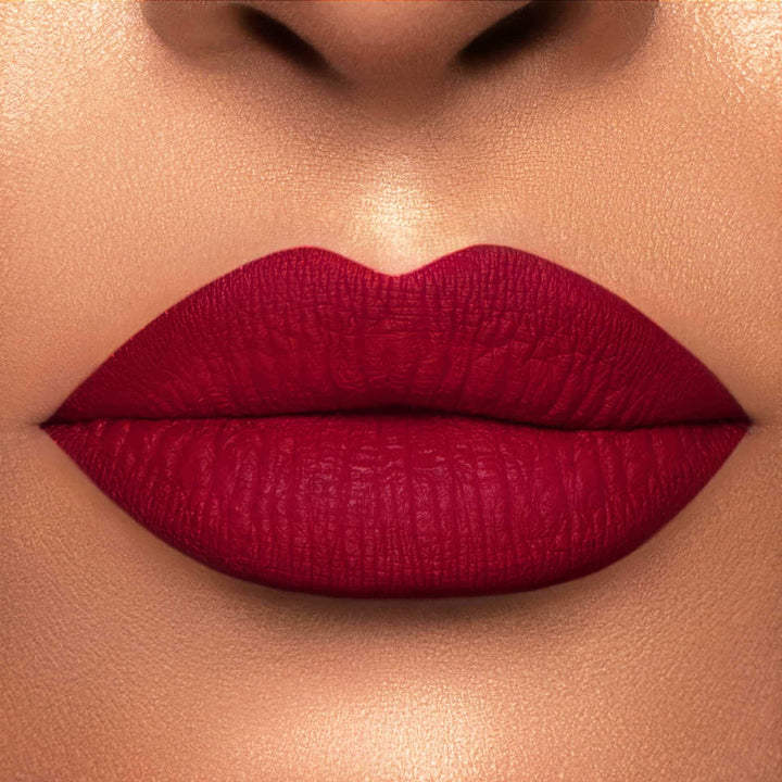 This is a light skin tone lip swatch of the Extra Saucy Liquid Matte Lip.