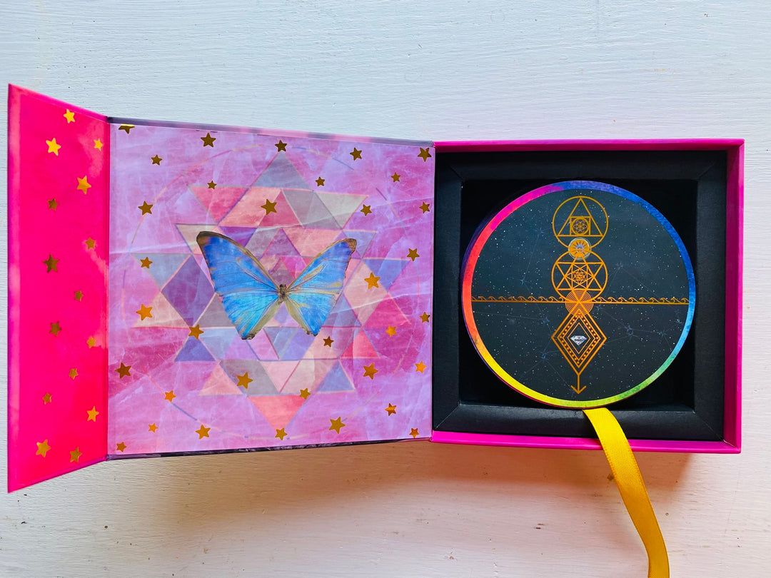 This is what you will see when you open up the Sacred Revolution Multi Media Oracle Deck. This is such a beautiful deck to own vibrant with almost all the colors of the rainbow