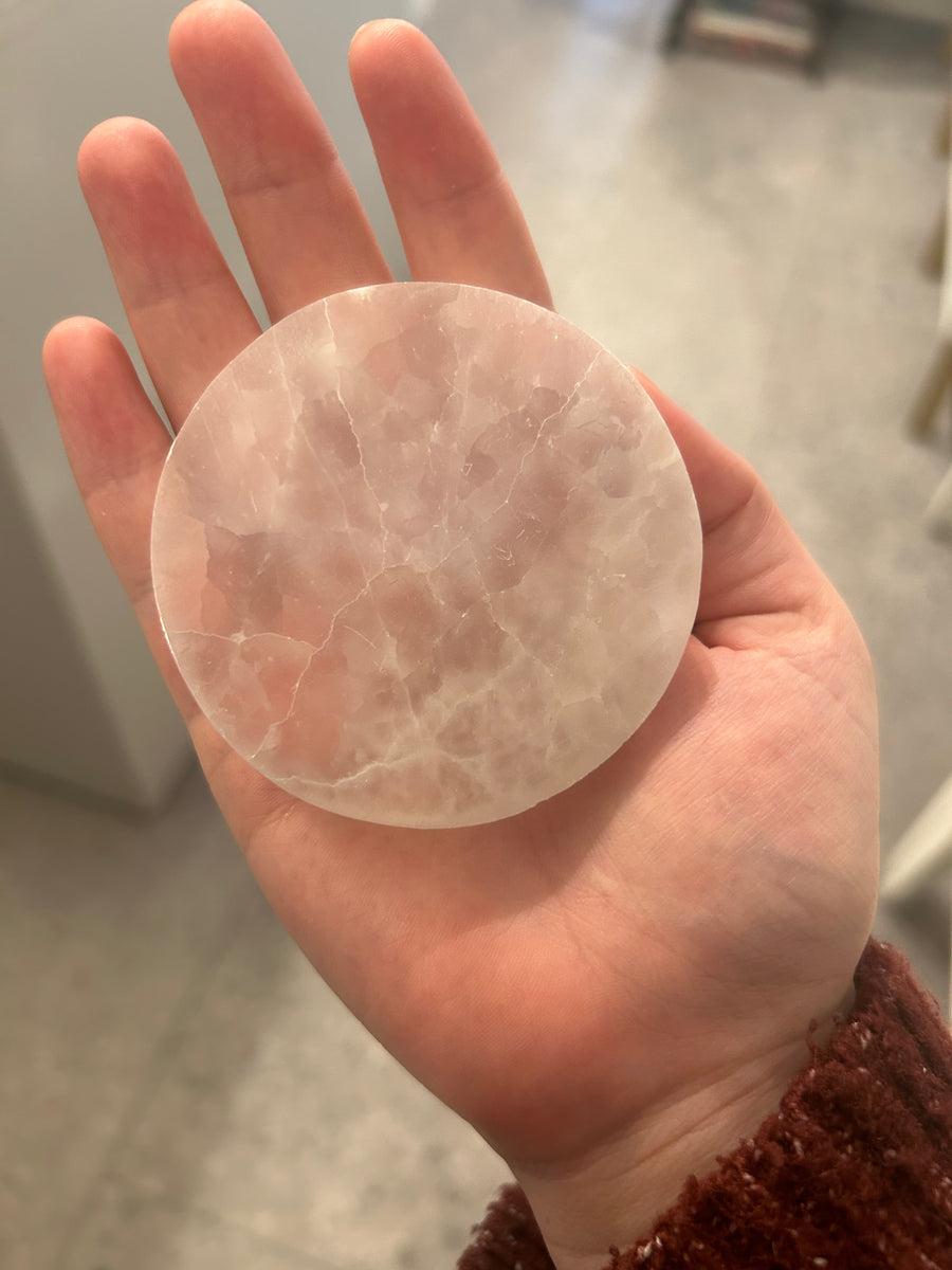 Small Selenite Charging Plate in the palm