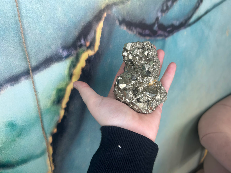 Large Pyrite Cluster being held