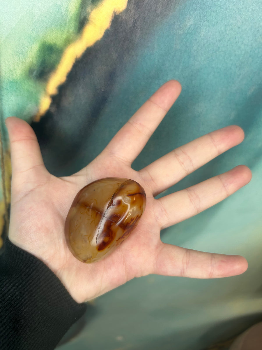 Carnelian Palm Stone in the palm of my hand