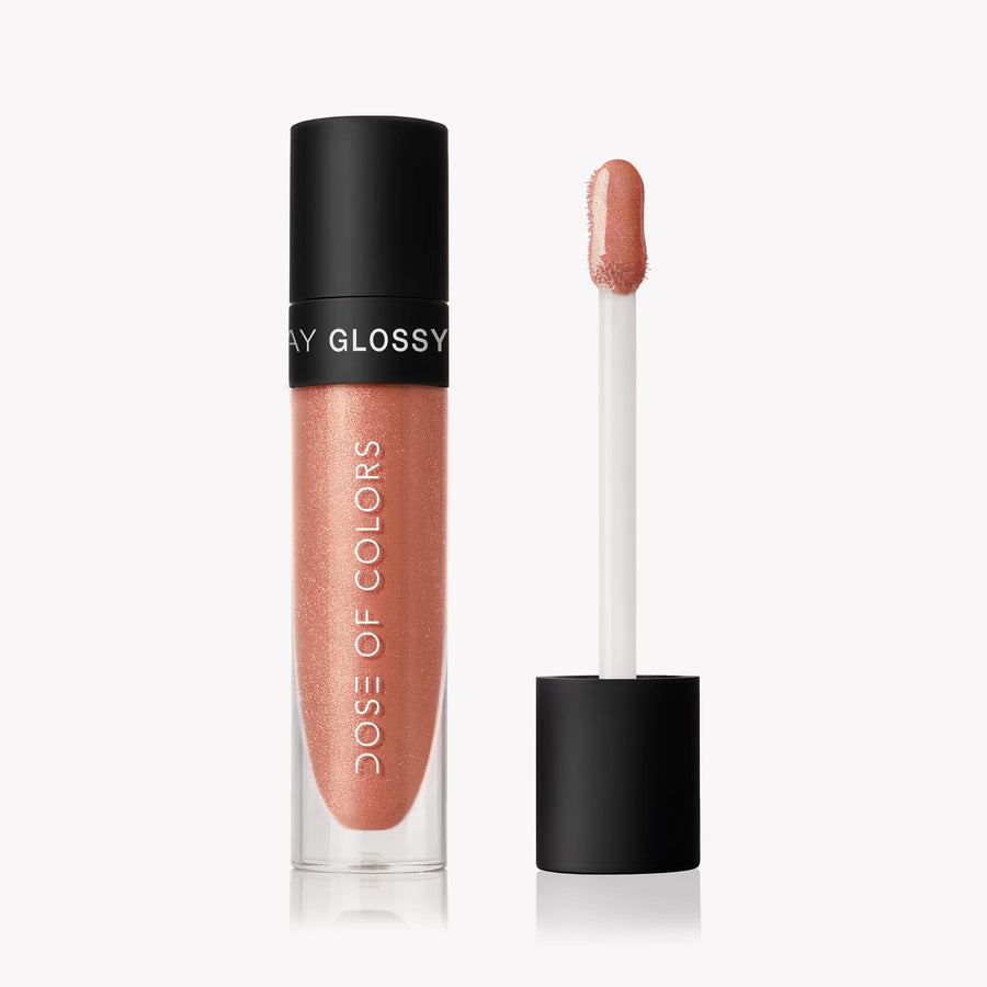 This is the Dose of Color Lip Gloss, Shade: Jazzy. The shade is a rose gold and so shimmery.  