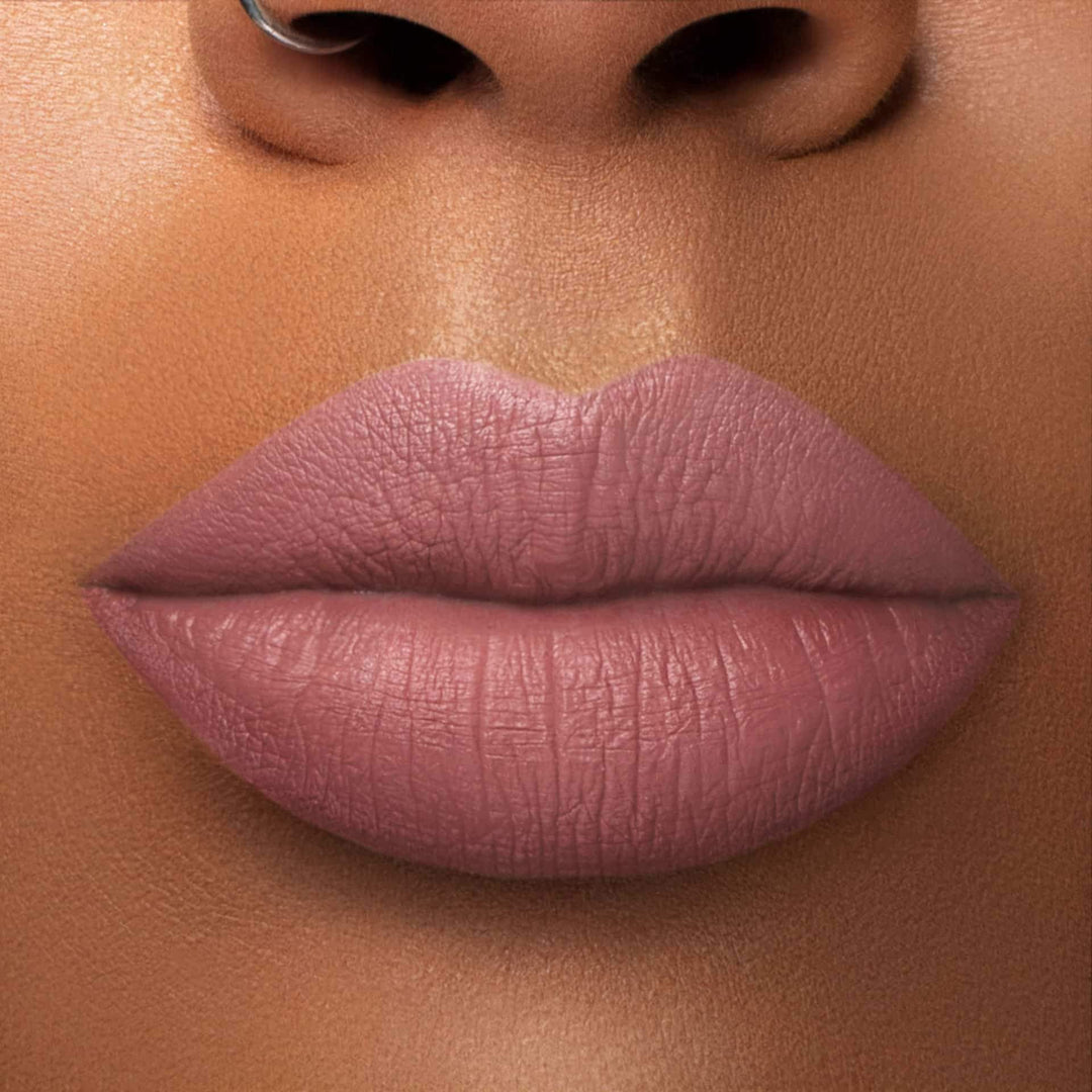 This is a medium skin tone lip swatch of the Lazy Daisy Liquid Matte Lip.