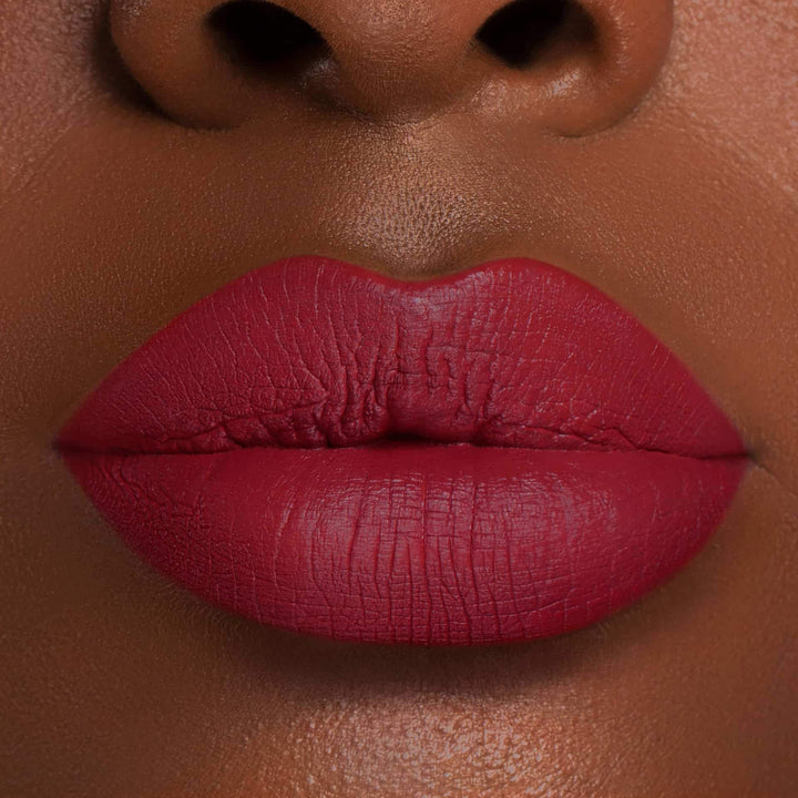 This is a dark skin tone lip swatch of the Los Anjealous Liquid Matte Lip.