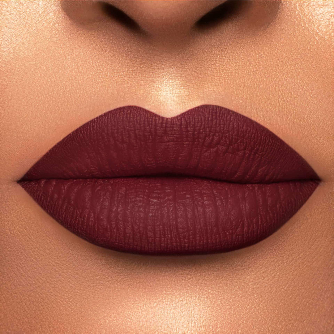 This is a light skin tone lip swatch of the Mood Liquid Matte Lip.