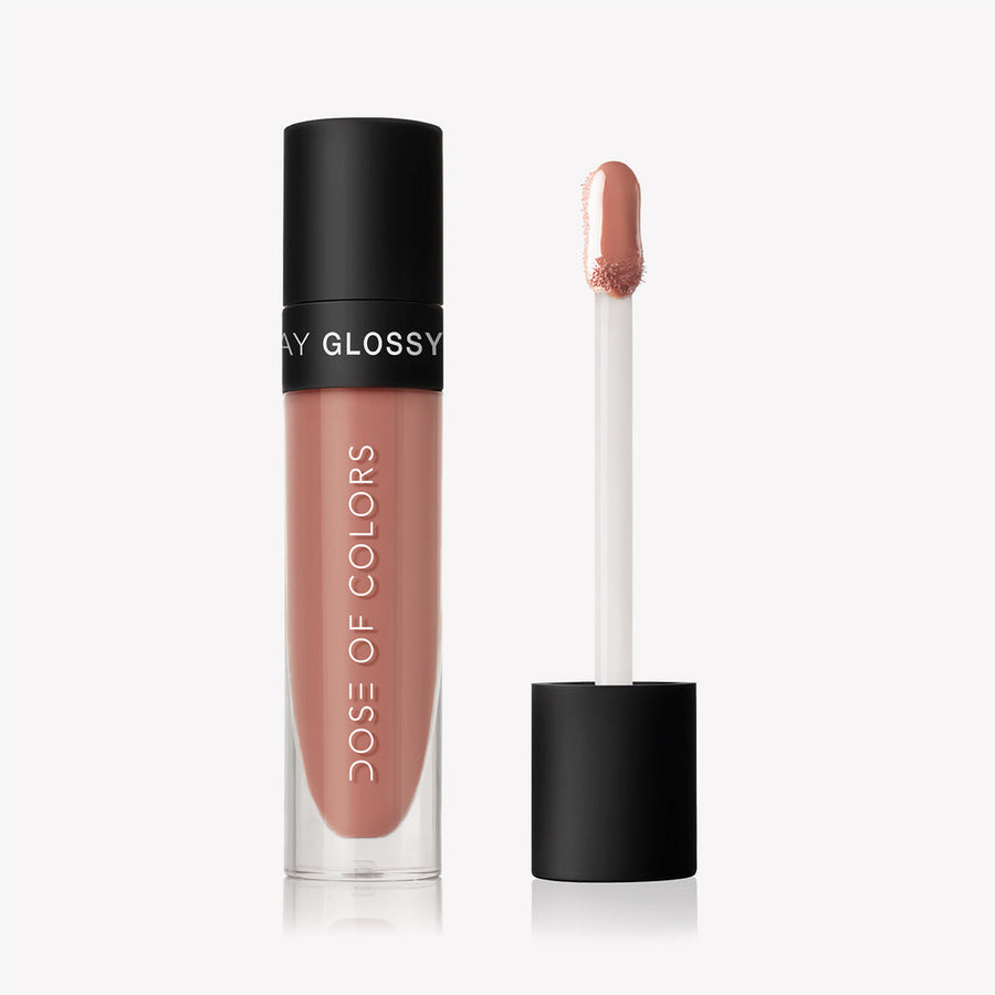 This is a Dose of Color Lip Gloss, Shade: Must Have. A complex mix of a darker nude and a nice pink.