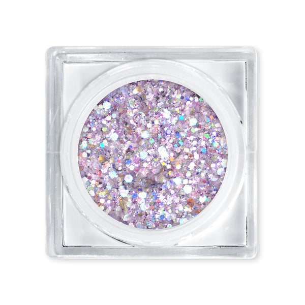 Iridescent glitter in a small open container on a white background
