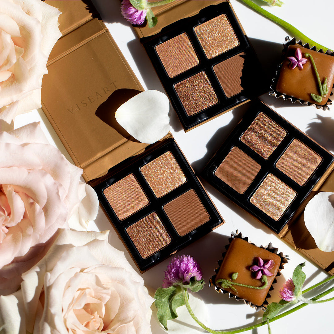 Another pretty picture of the Petits Fours Praline pallet not only with chocolates in the background but beautiful roses as well.