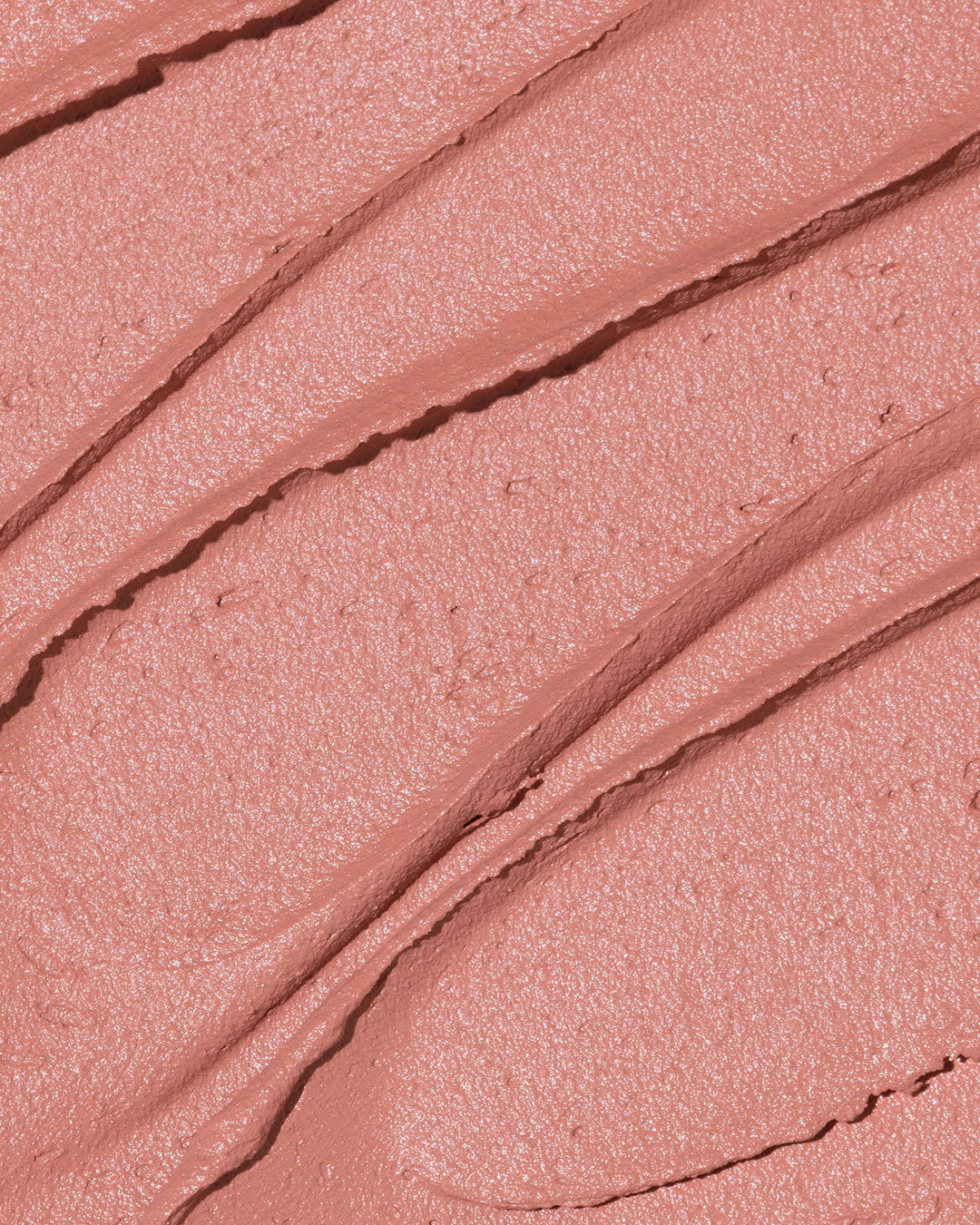 Swatch of Plush Velvet Mousse Lipstick. Beautiful sea of soft pink for a great everyday look.