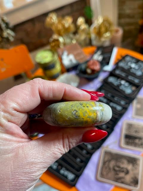 Side of the Bumble Bee Jasper Palm Stone