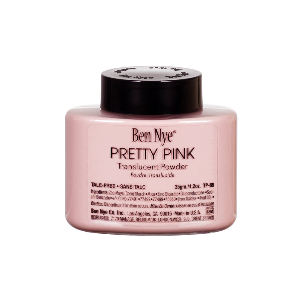 Ben Nye Pretty Pink Translucent Powder in a square pink jar with a black lid, on a white background.