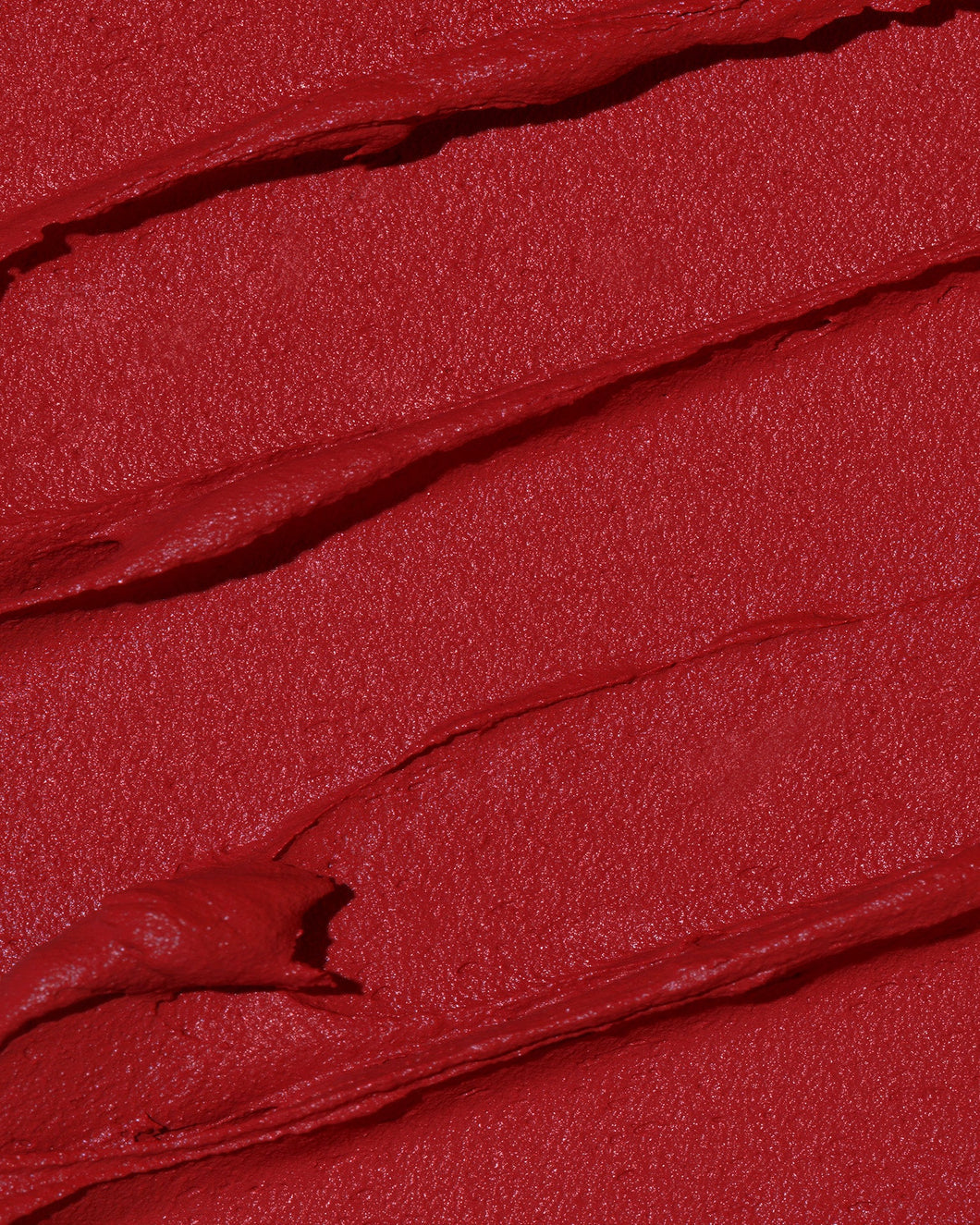 A swatch of the Twin Flame Velvet Mousse Lipstick. This looks so good that you may want a bite.