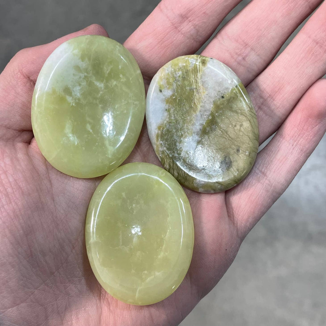 Serpentine Oval Worry Stones in hand