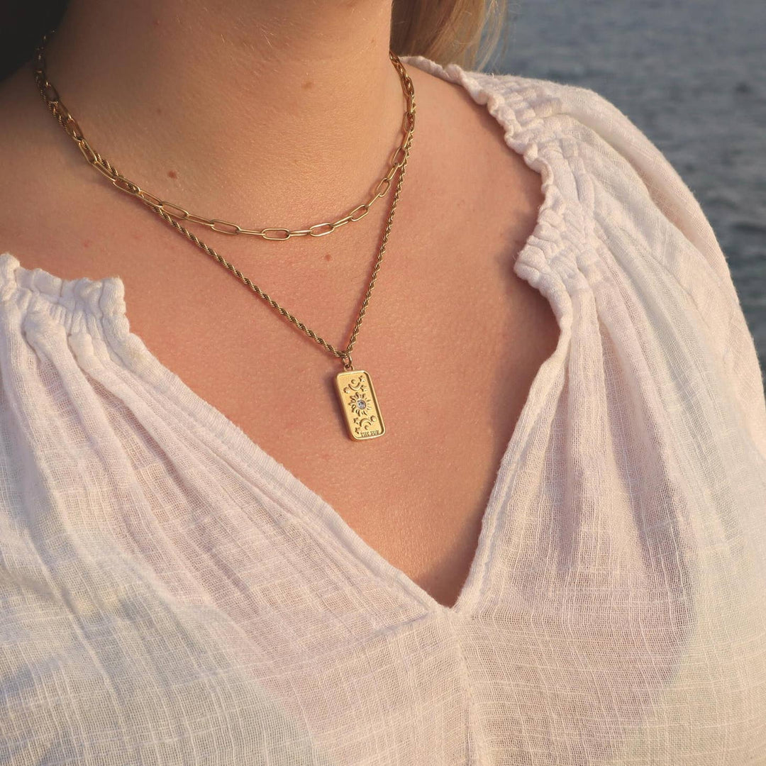 The Sun' Tarot Card Necklace on a different model