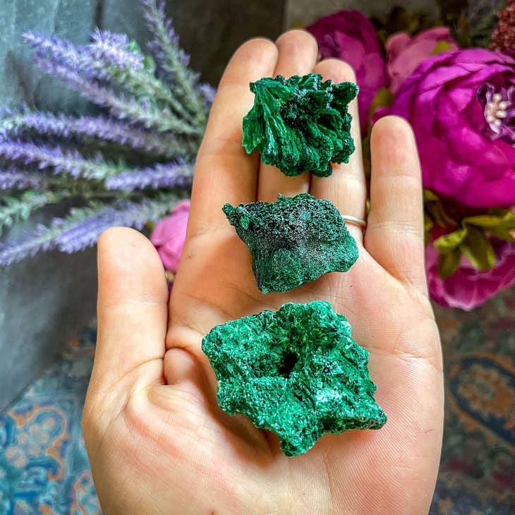 Fibrous Malachite in the palm of a hand