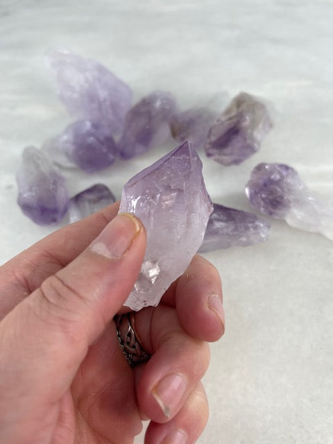 Holding Amethyst Points